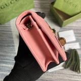 Top view of elevated signature women's handbag – women's statement bag