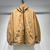 Front view of Louis Vuitton luxury clothing with label-forward styling