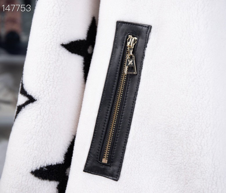 Full styled look of Louis Vuitton luxury clothing with signature branding
