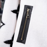 Full styled look of Louis Vuitton luxury clothing with signature branding