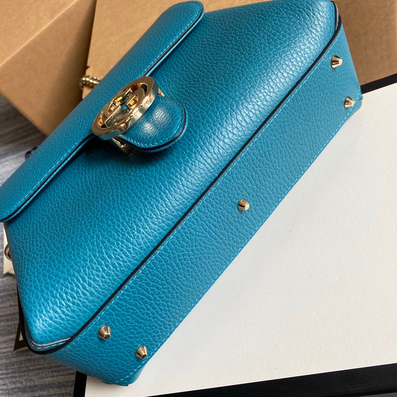 Styled lifestyle shot of signature polished women's handbag – women's everyday handbag