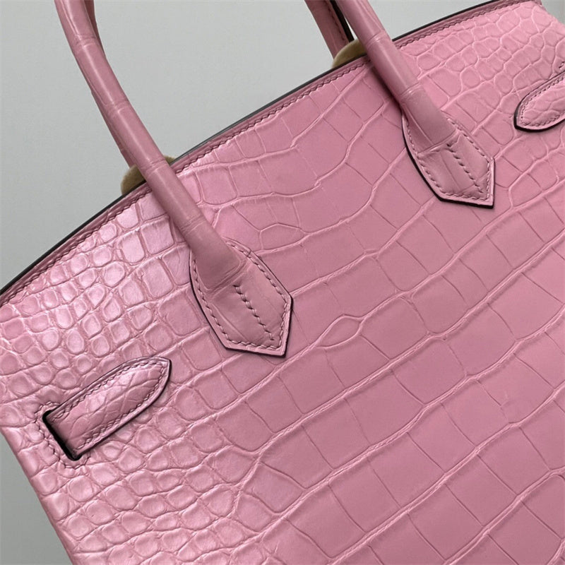 Side view of refined structured handbag