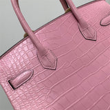 Side view of refined structured handbag