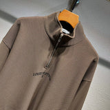 Close-up detail shot of Louis Vuitton luxury clothing with monogram-inspired silhouette