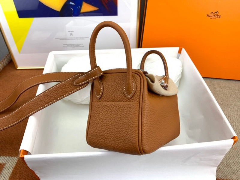  Understated structured bag carried on shoulder