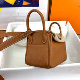  Understated structured bag carried on shoulder
