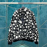 Front view of Louis Vuitton luxury clothing with logo-detail design