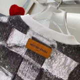 Back view of Louis Vuitton luxury clothing with streetwear-inspired cut