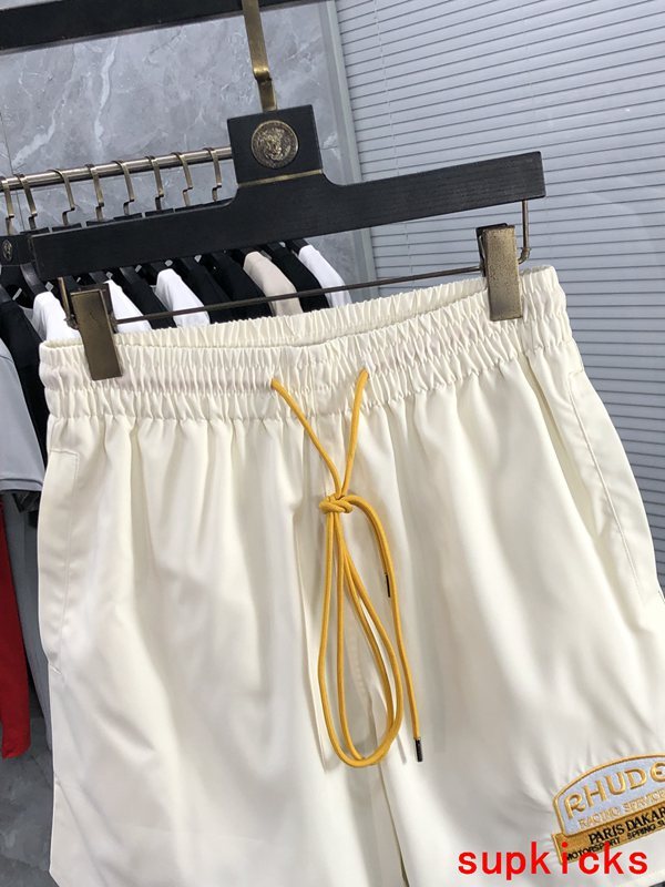 Close-up detail shot of Rhude luxury clothing with streetwear-inspired cut