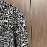 Full styled look of Louis Vuitton luxury clothing with logo-detail design