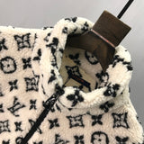 Close-up detail shot of Louis Vuitton luxury clothing with logo-detail design