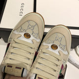 Gucci two-tone luxury sneakers view 4 signature lace-up style