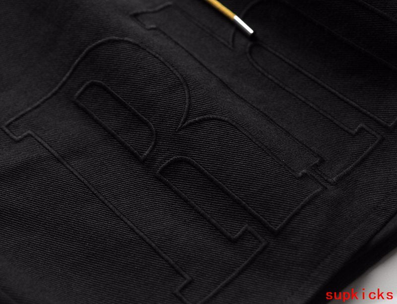 Back view of Rhude luxury clothing with everyday silhouette