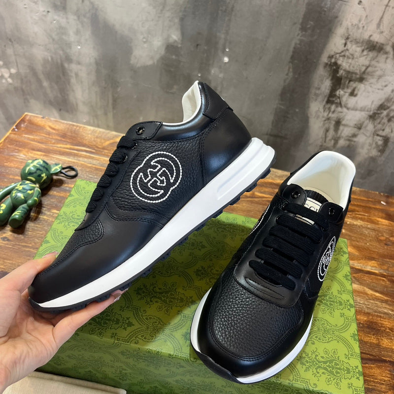 Gucci tonal black luxury sneakers view 9 bold athletic profile