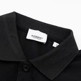 Close-up detail shot of Polo cotton polo shirt with monogram-inspired silhouette