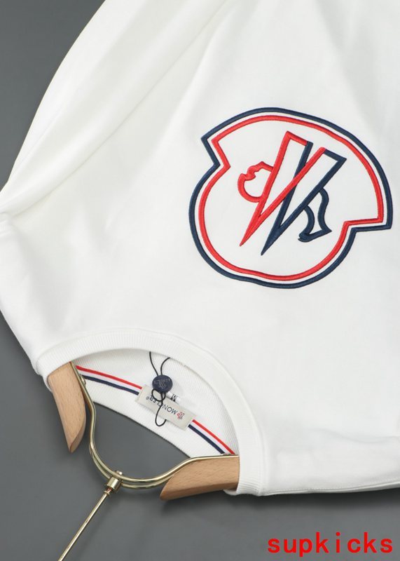 Close-up detail shot of Moncler luxury clothing with everyday silhouette
