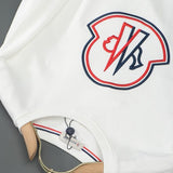 Close-up detail shot of Moncler luxury clothing with everyday silhouette