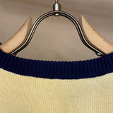 Close-up detail shot of Gucci luxury clothing with label-forward styling