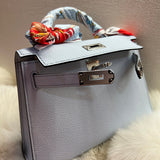 Side view of elegant structured handbag