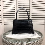 Close-up detail of sleek classic women's handbag – women's everyday handbag