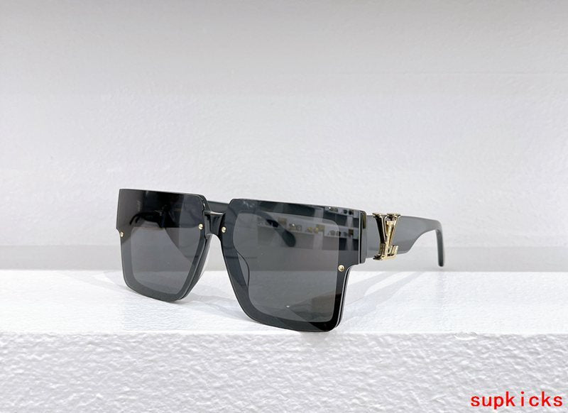 Close-up detail view of Louis Vuitton unisex sunglasses