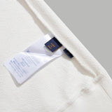 Side profile of Louis Vuitton luxury clothing with signature branding