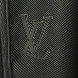 Flat lay presentation of Louis Vuitton luxury clothing with label-forward styling