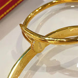 Lifestyle view of Cartier unisex jewelry piece