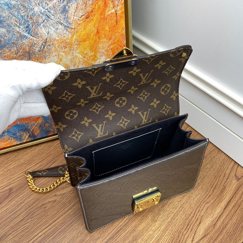 Front view of structured everyday-luxe women's handbag – women's luxury handbag