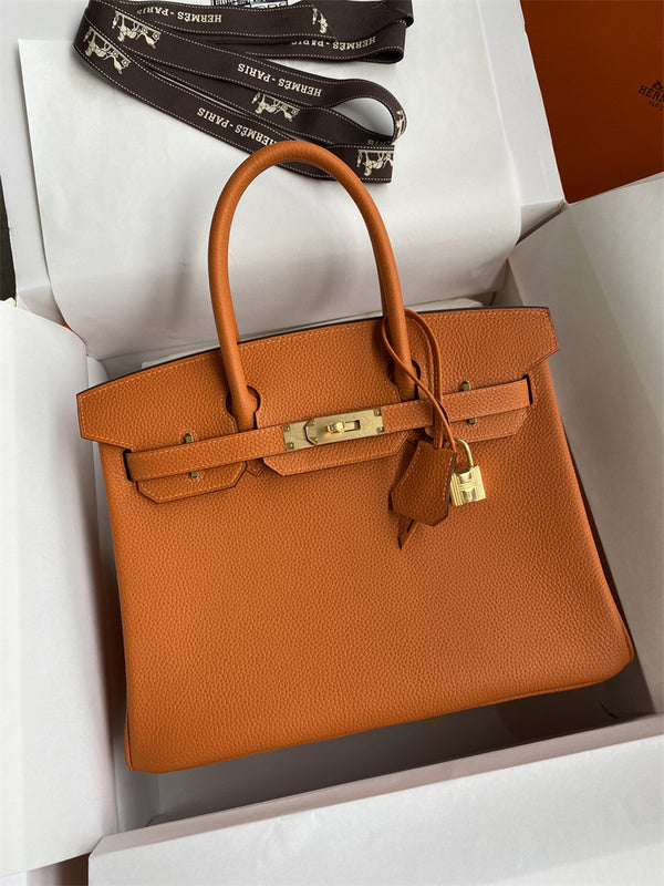 Side view of minimalist structured handbag