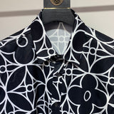 Close-up detail shot of Louis Vuitton cotton t-shirt with signature branding