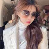 Side view of Louis Vuitton unisex sunglasses