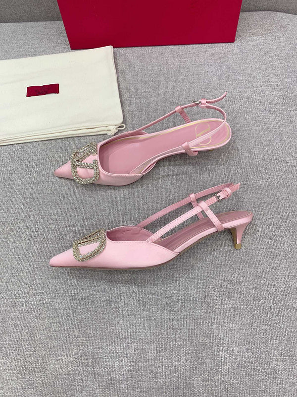 Three-quarter angle view of Valentino Garavani luxury piece style No.207