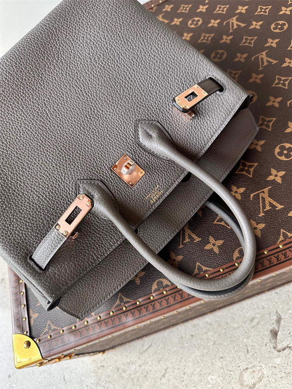  polished top-handle bag detail view showing craftsmanship 8