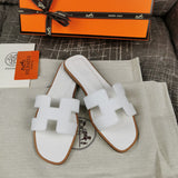 Hermès Nude Ankle Strap Sandals - Heel Detail View