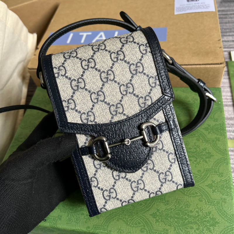 Handle and strap detail of sleek structured women's handbag – women's designer-style accessory