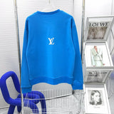 Front view of Louis Vuitton luxury clothing with signature branding