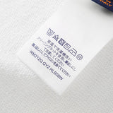 Back view of Louis Vuitton luxury clothing with signature branding