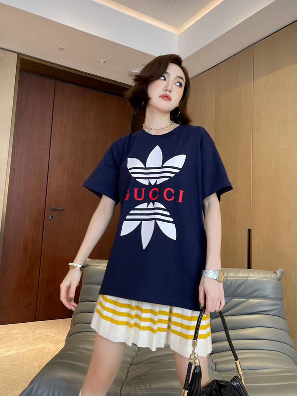 Side profile of Gucci luxury clothing with signature branding