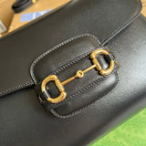 Back view of polished refined women's handbag – women's designer-style accessory