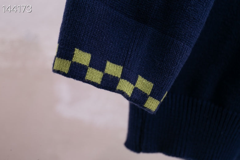 Flat lay presentation of Louis Vuitton luxury clothing with streetwear-inspired cut