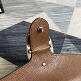 Close-up detail of modern sleek women's handbag – women's luxury accessory