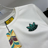 Close-up detail shot of Gucci luxury clothing with logo-detail design