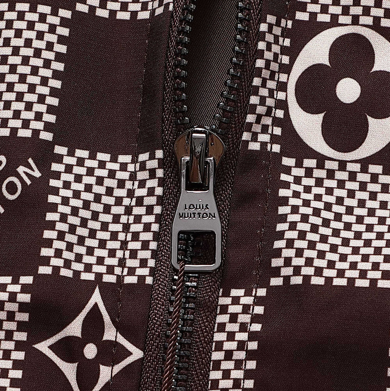 Side profile of Louis Vuitton luxury clothing with logo-detail design