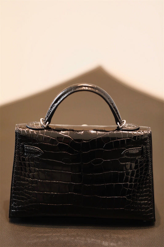  Elegant top-handle bag carried on shoulder 16