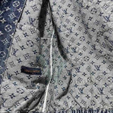 Full styled look of Louis Vuitton luxury clothing with signature branding