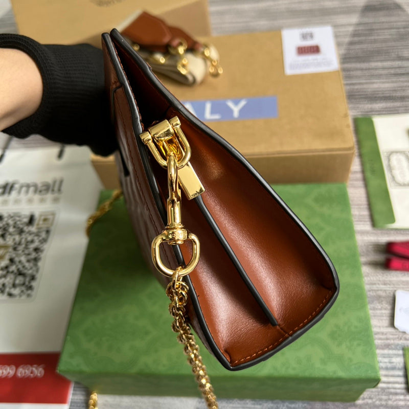 Top view of refined sleek women's handbag – women's luxury accessory