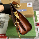 Top view of refined sleek women's handbag – women's luxury accessory