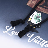 Flat lay presentation of Louis Vuitton luxury clothing with tailored silhouette