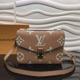 Front view of structured polished women's handbag – women's luxury accessory